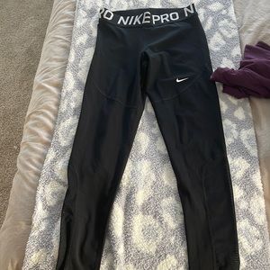 Nike pro leggings. Brand new. Worn once. Has mesh on bottom part of legging